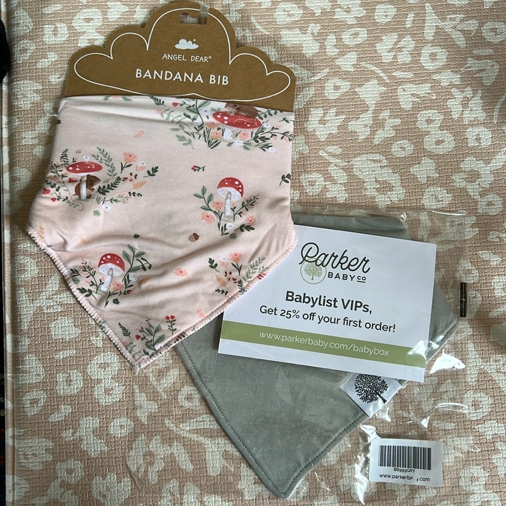 Two bibs: Angel Dear and Parker